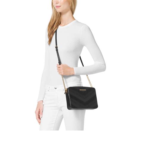 michael kors jet set black medium|Michael Kors jet setter crossbody.